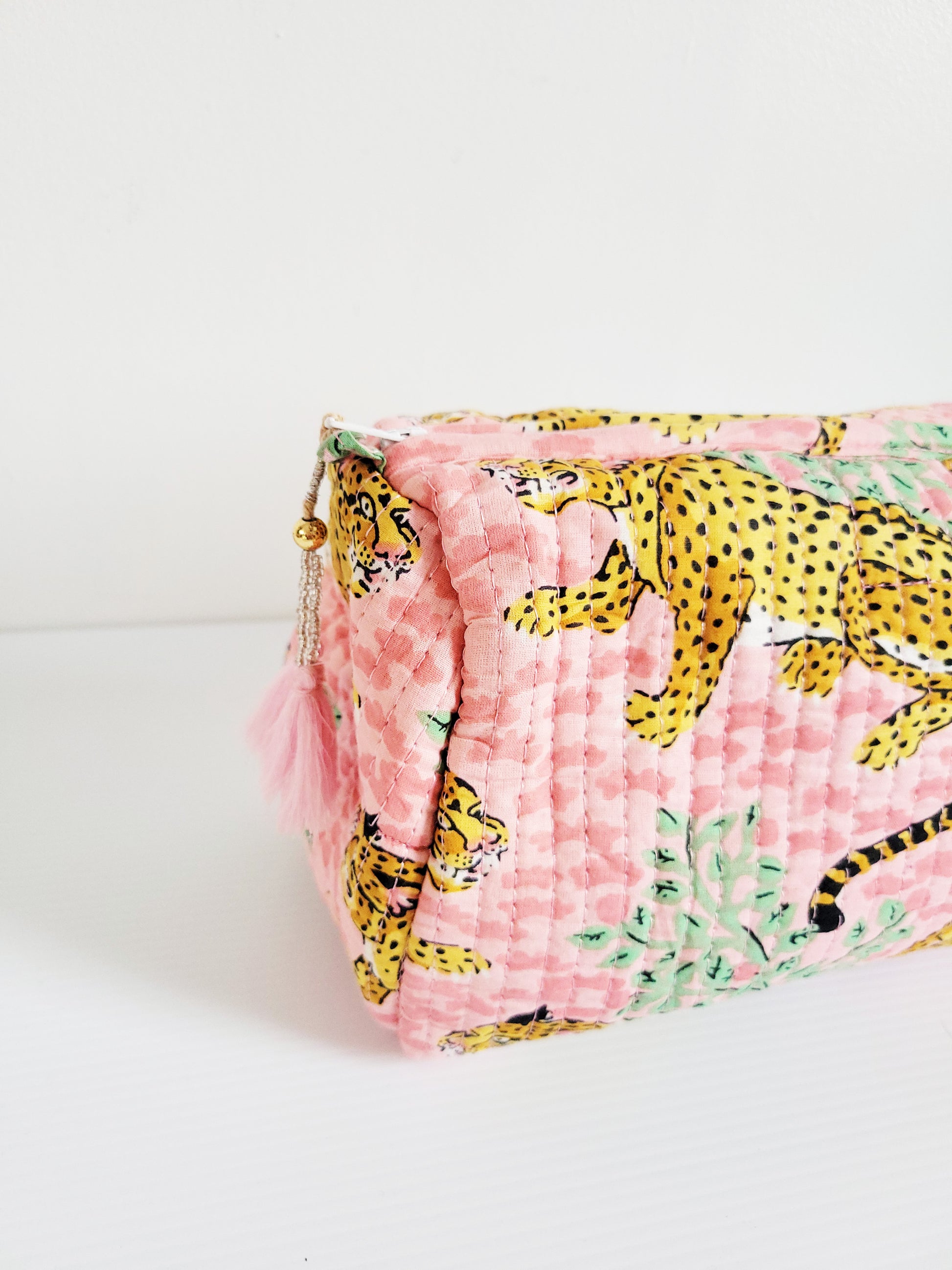 Brown and pink leopard print tote bag.