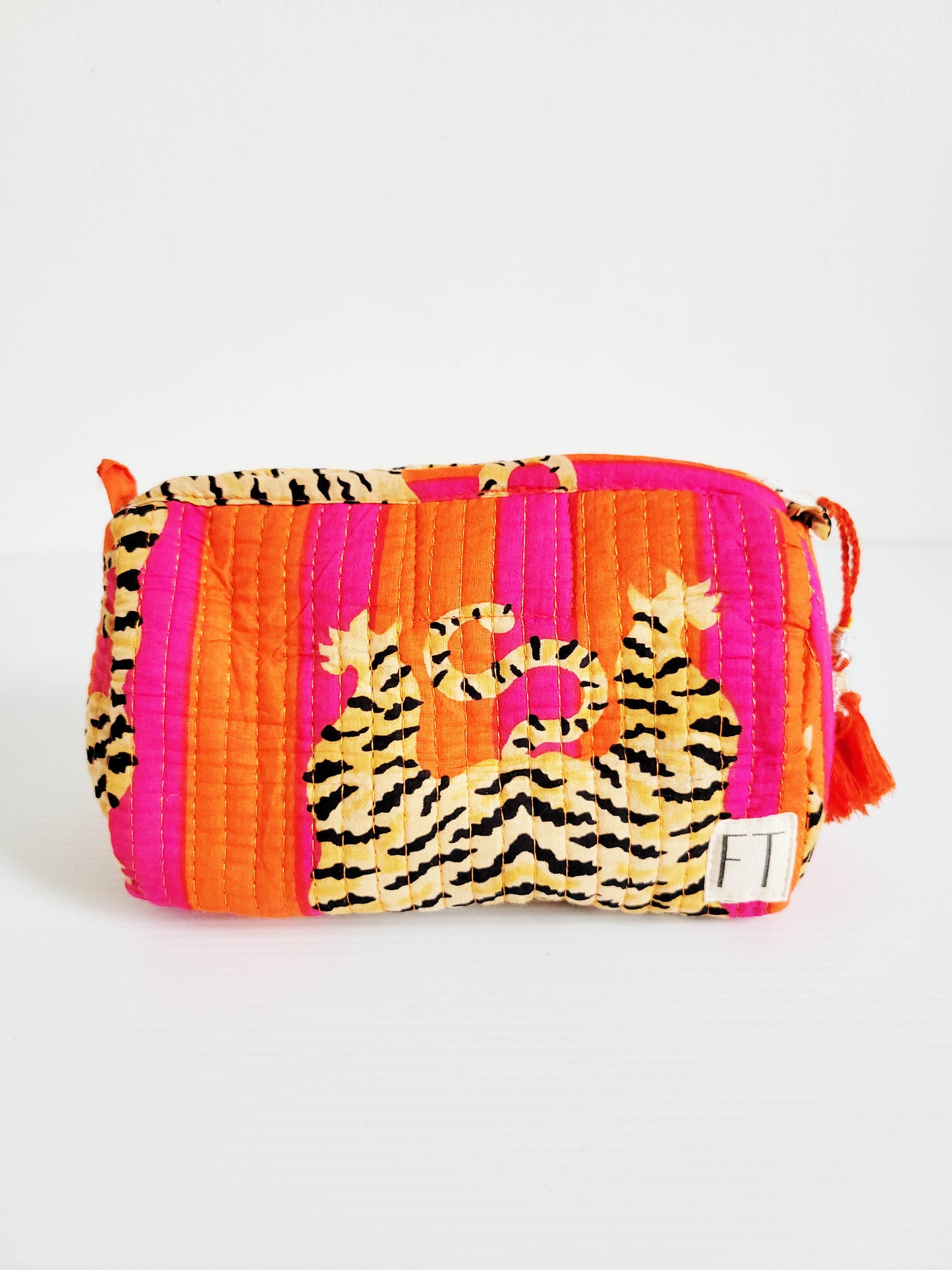 Close-up of light pink leopard print tote.