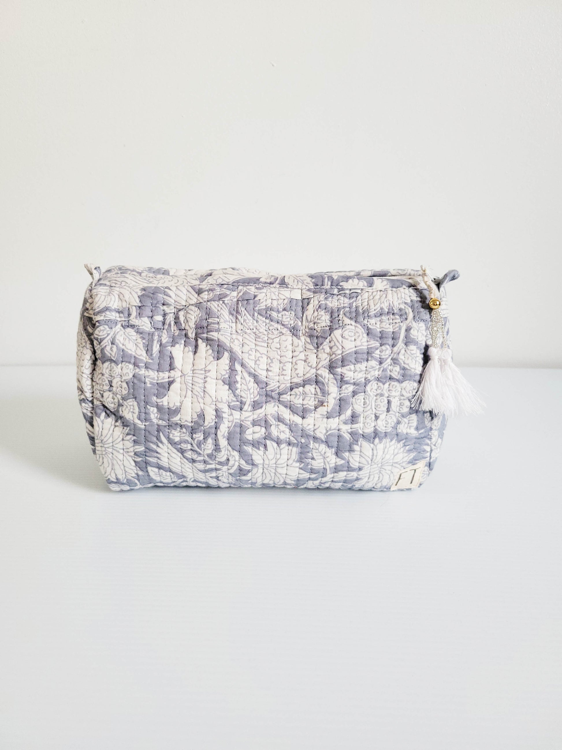 Dark pink leopard tote bag with white background.