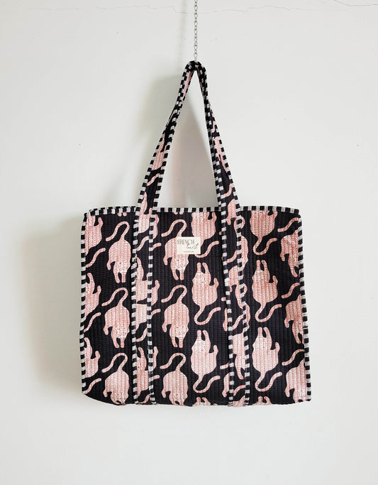 Side view of pink zebra leopard tote.