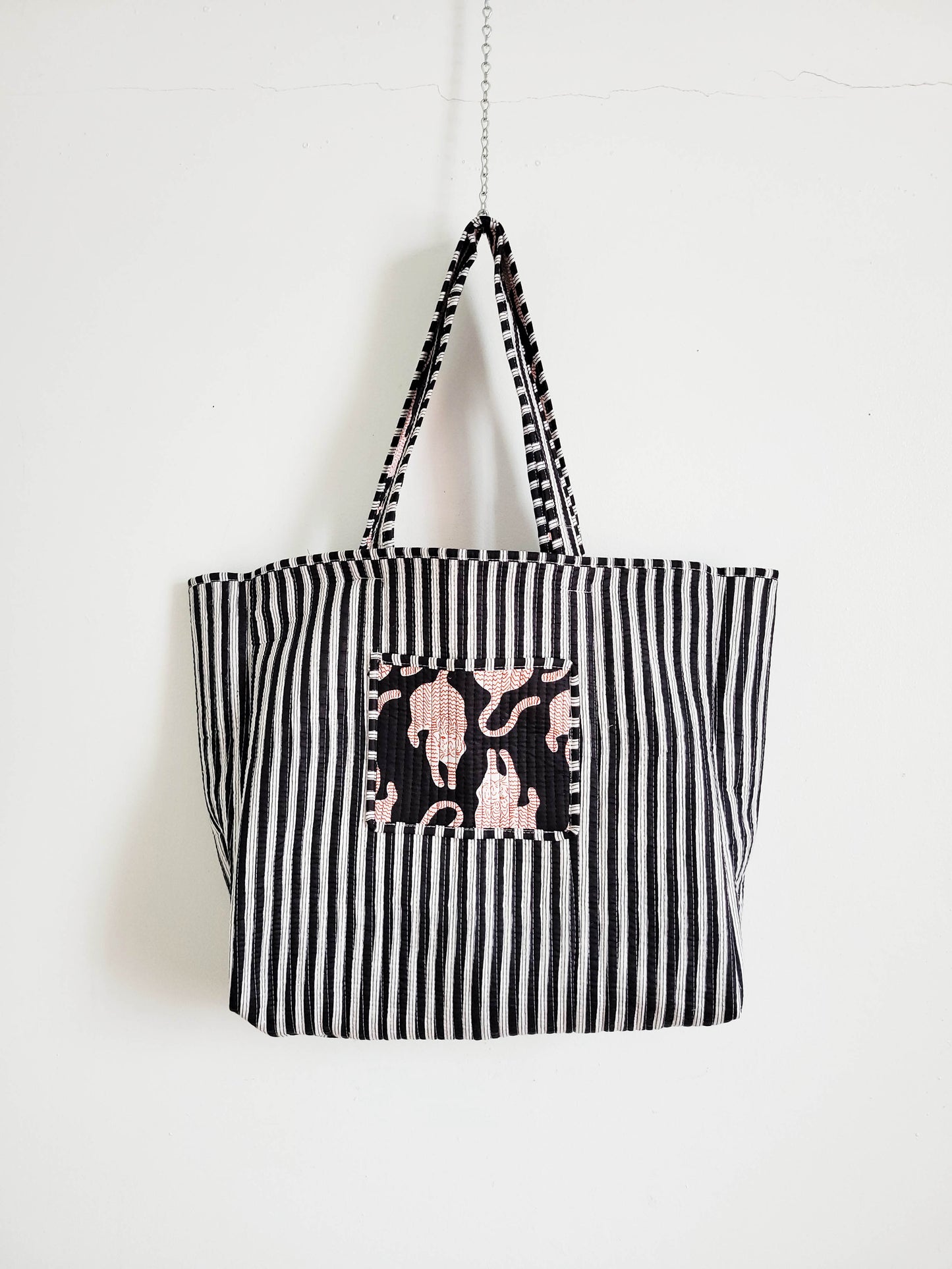 Close-up of pink zebra leopard tote.