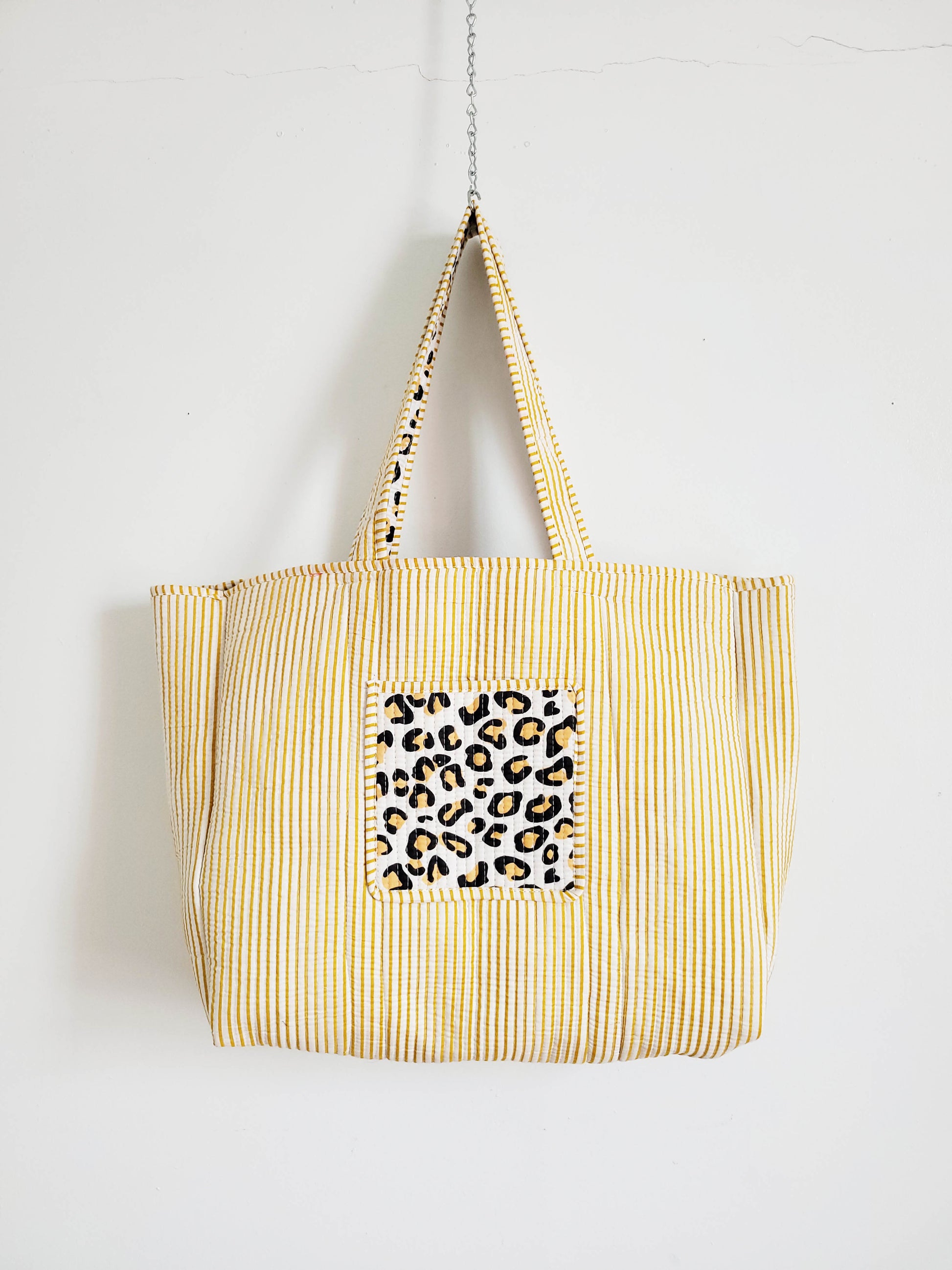 Makeup bag in dark pink color.