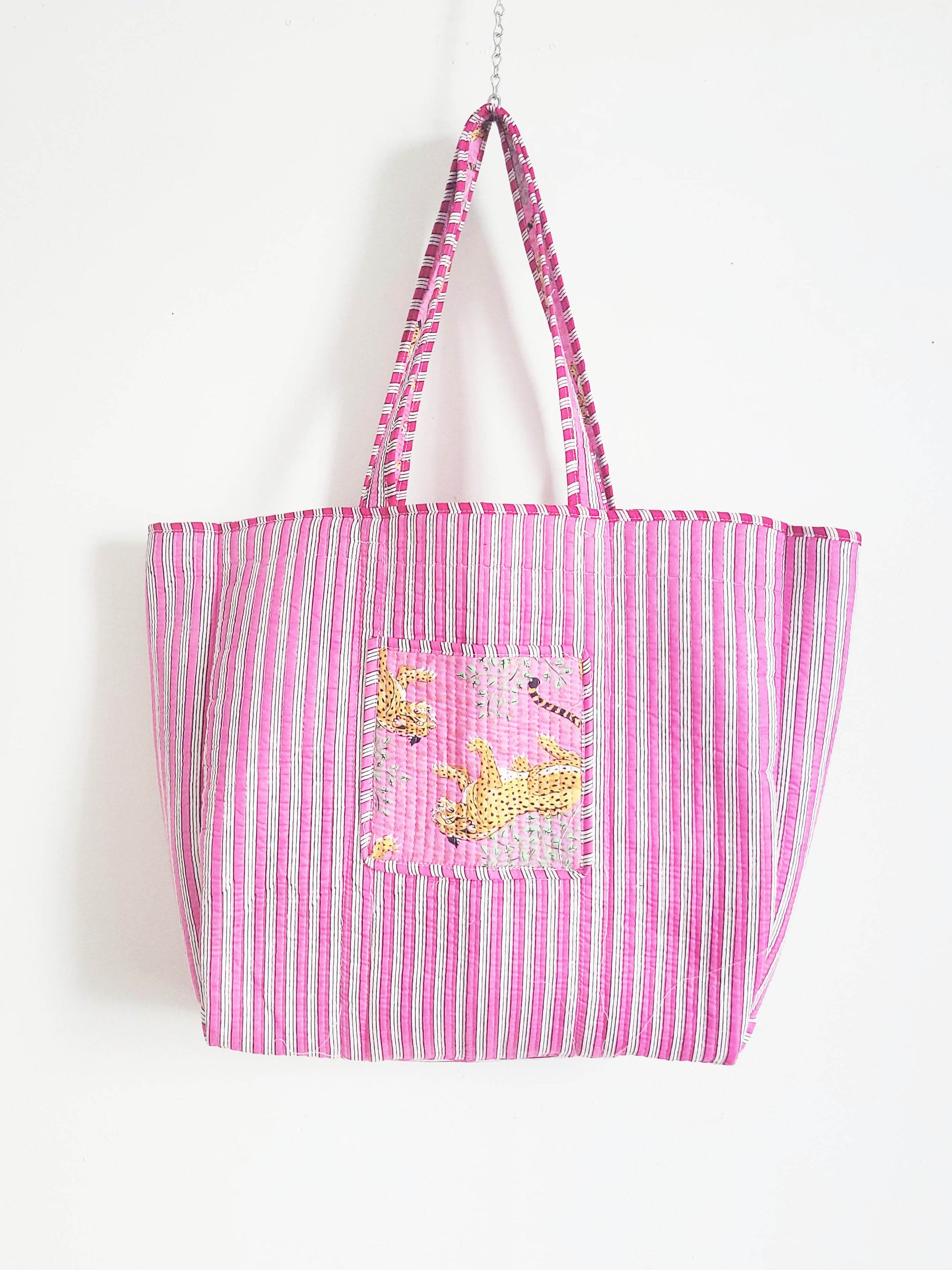 Flat-lay of accessories and clothing on table.