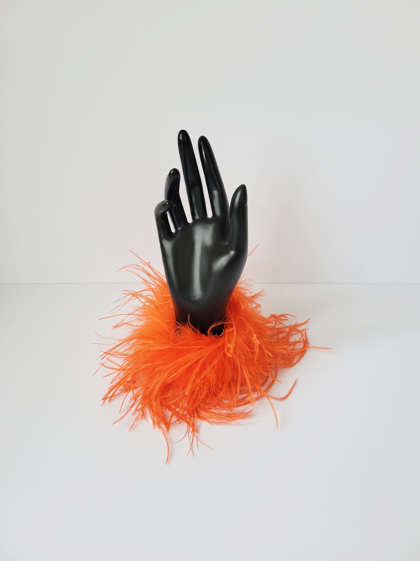 Orange Feather Cuffs